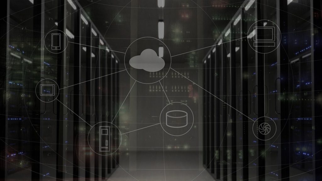 A dimly lit data center corridor with server racks on either side showcases the essence