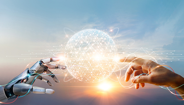 A human hand and a robotic hand reach towards a glowing digital sphere against a sky background. The sphere, surrounded by interconnected lines, symbolizes connectivity and collaboration, reflecting the seamless integration of IT support in advancing the partnership between technology and humanity.